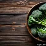 혈액순환을 돕는 음식 베스트 - A vibrant and detailed still life of fresh dark green leafy vegetables like spinach, kale, and brocc...